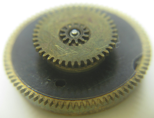 mainspring barrel with double friction gear 