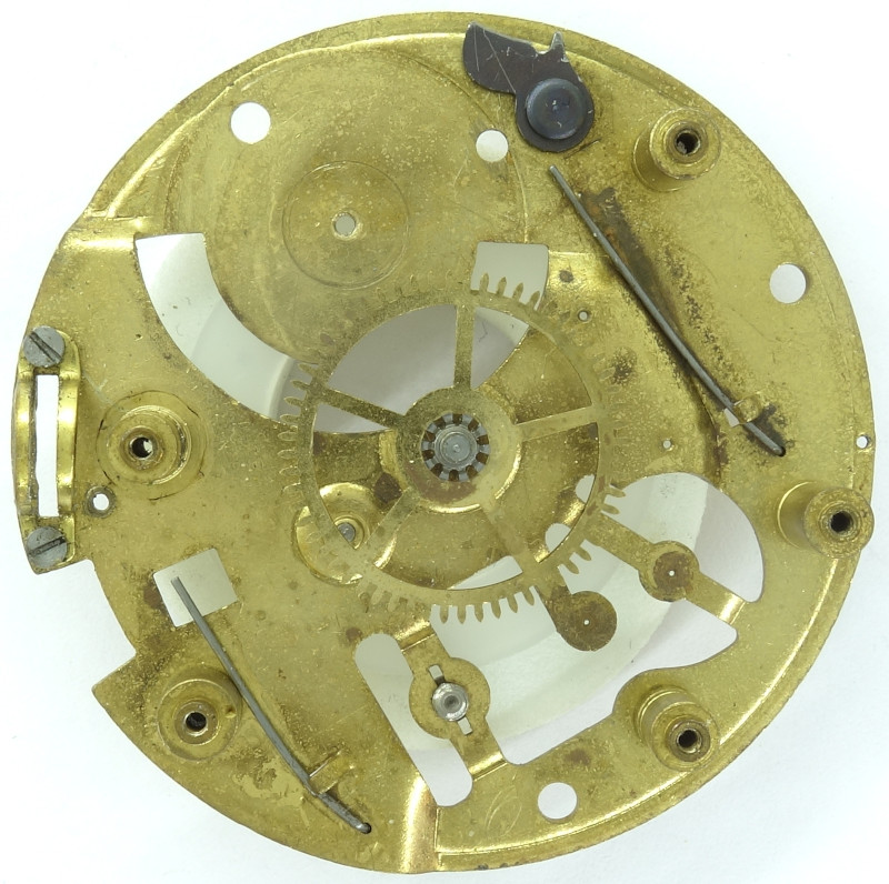 base plate with riveted minute wheel