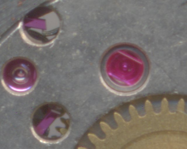 detail: cap jewel of the escapement wheel bearing