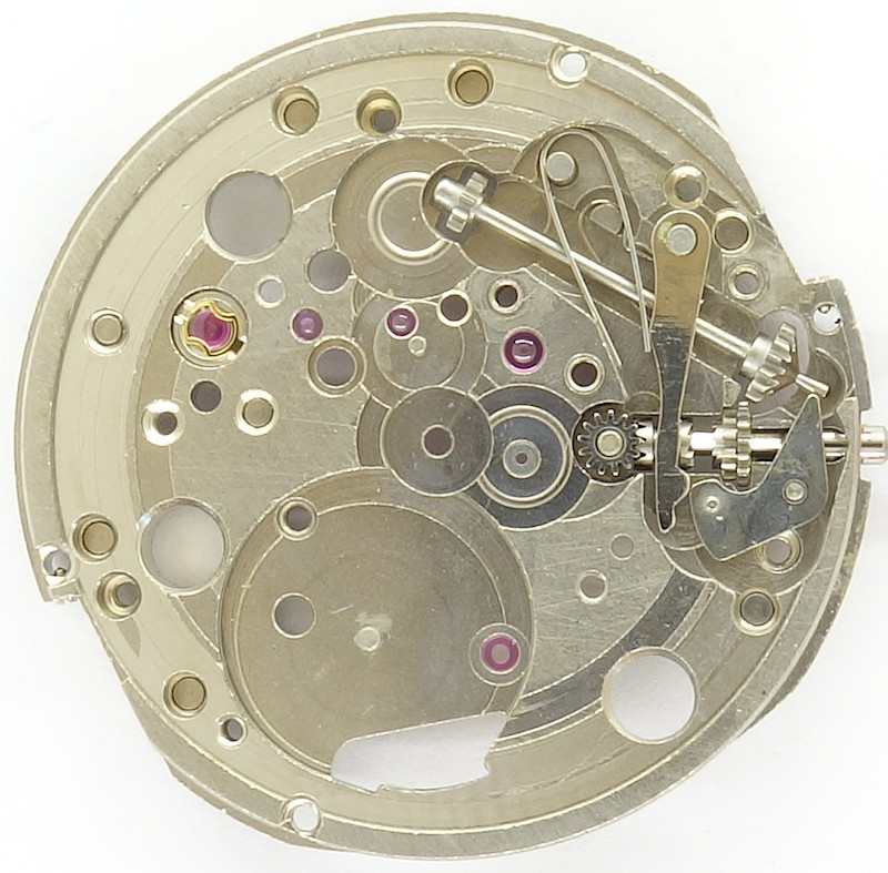 empty dial side, crown in hands setting position