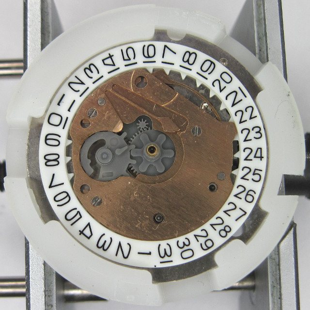 Q&Q 2604: cover of the cover of the date mechanism