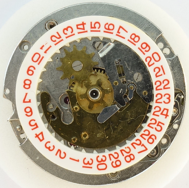 calendar mechanism with mispositioned spring at 1 o'clock