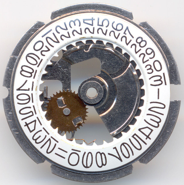 Timex M105: date mechanism plate